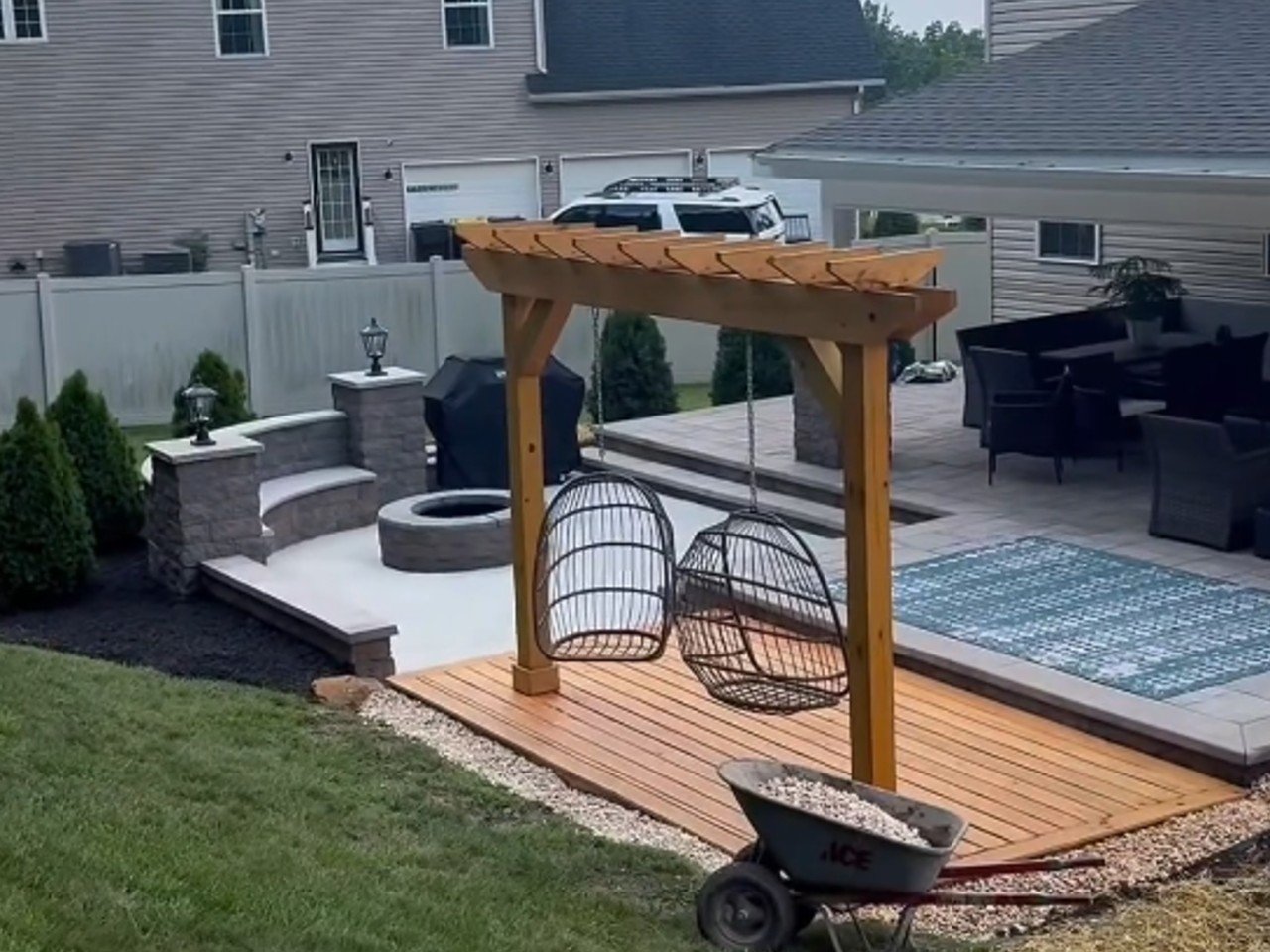 Extensive backyard redesign incorporating a porch and porch roof renovation,